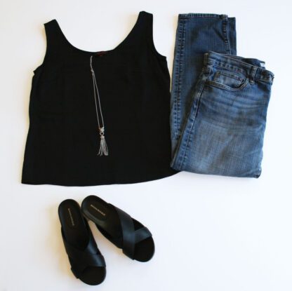 Escada women's black silk sleeveless blouse styled with jeans