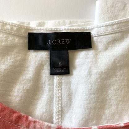 a tee with a closeup view of the J.Crew brand label and the size tag