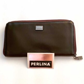 Front view of a vintage Perlina large leather wallet with the Perlina information card usually found inside a new wallet.