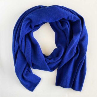 A bright blue Saks Fifth Avenue pure cashmere wrap twisted into a circle.
