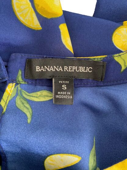 Close up view of the Banana Republic brand tag and size information for a blouse